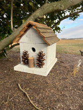 Load image into Gallery viewer, Rustic Wooden Cabin Birdhouse with Pinecone Accents
