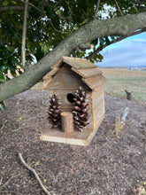 Load image into Gallery viewer, Rustic Wooden Cabin Birdhouse with Pinecone Accents